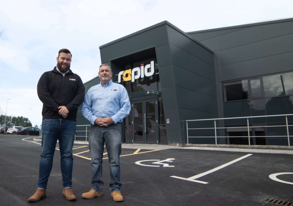 Mark Lappin and John Pickering pictured outside Rapid's newly renovated offices on 50th anniversary.